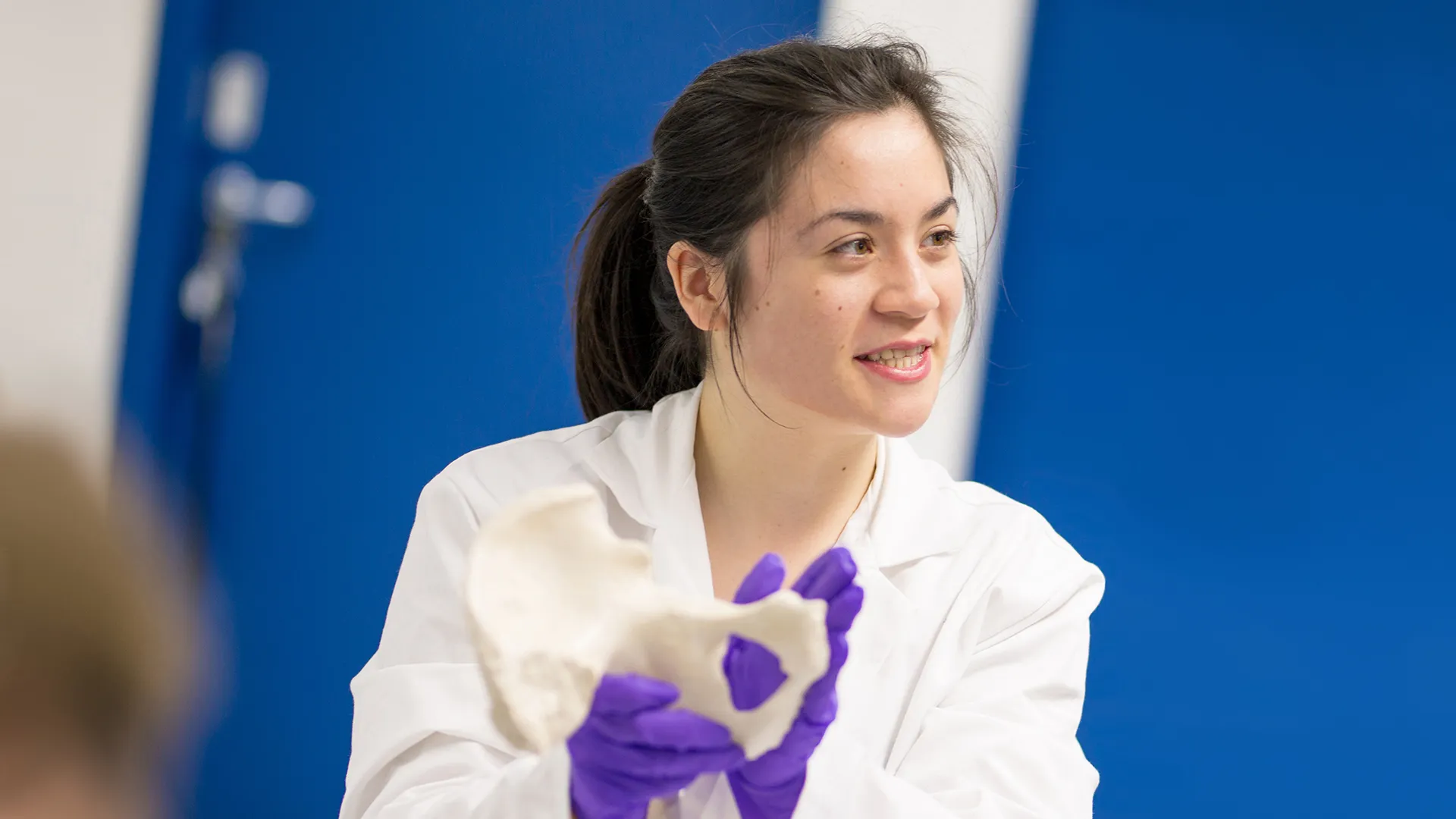 A student studying bones