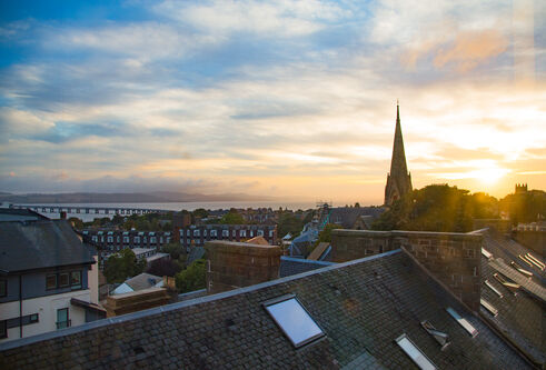 View over campus rooftops to the River Tay