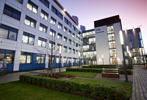 White building with "life sciences" written on the side