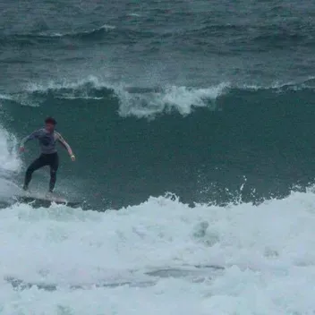 student surfing