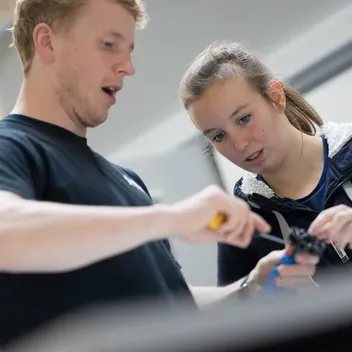 Mechanical Engineering students in a lab