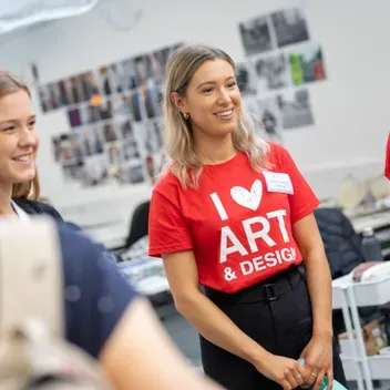 Student Ambassadors with I heart Art & Design t-shirts standing in studio in DJCAD