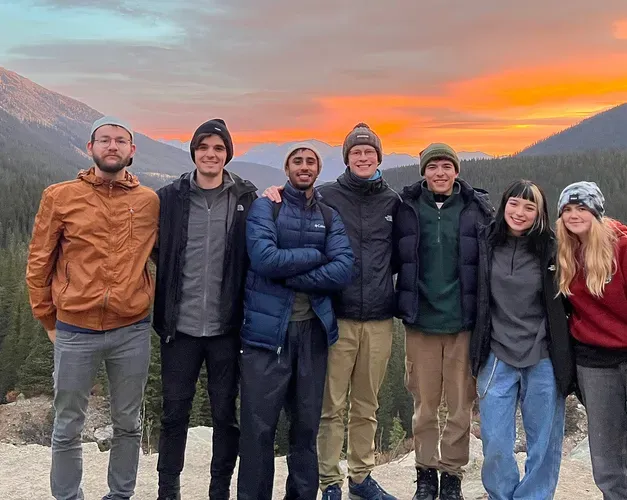 Group of exchange students who travelled around Banff at Lake Moraine at sunrise. Four of them were English exchange students, one from Luxembourg and another from Germany. 